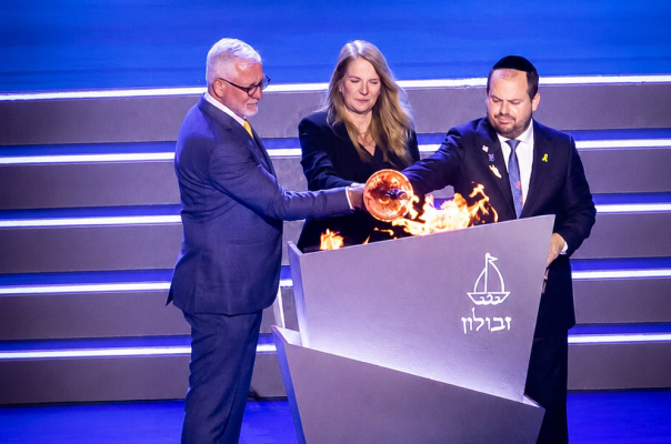 Haim Taib and two others lighting the torch for Israel’s 77th Independence Day Ceremony